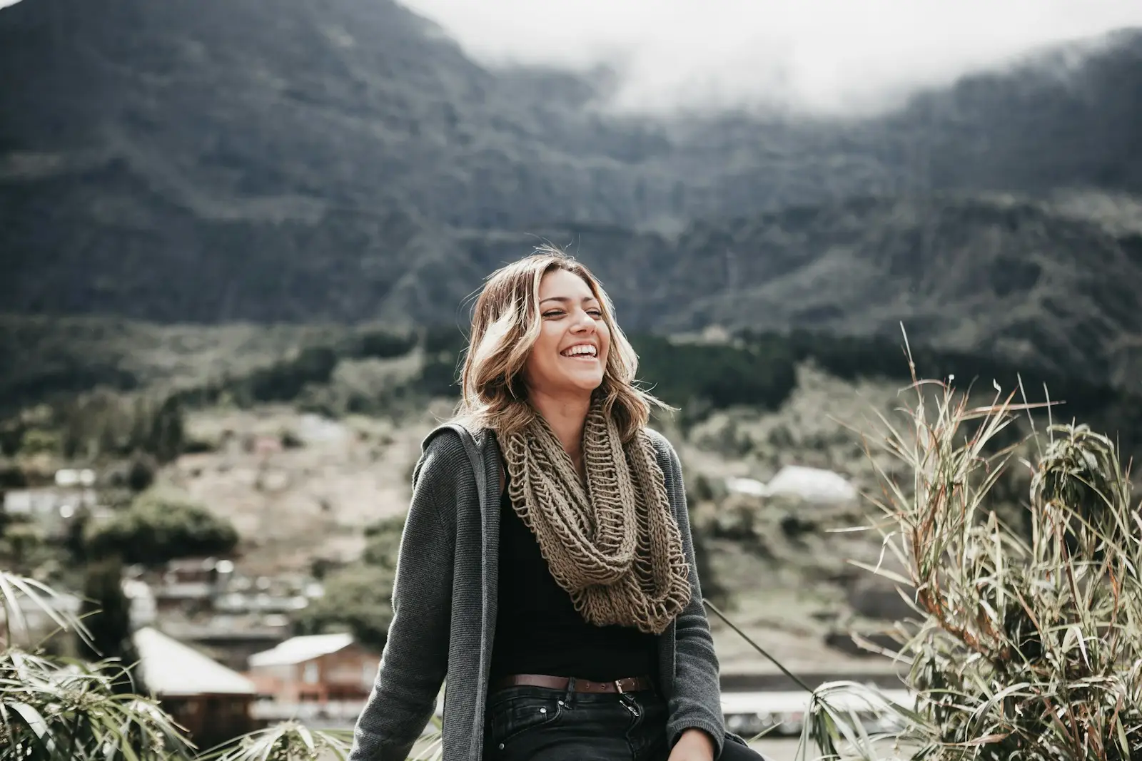 smiling woman outside, blog post about hiring a confidence coach