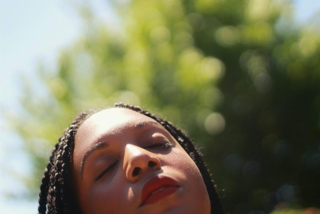 womans face in close up photography, peaceful woman 