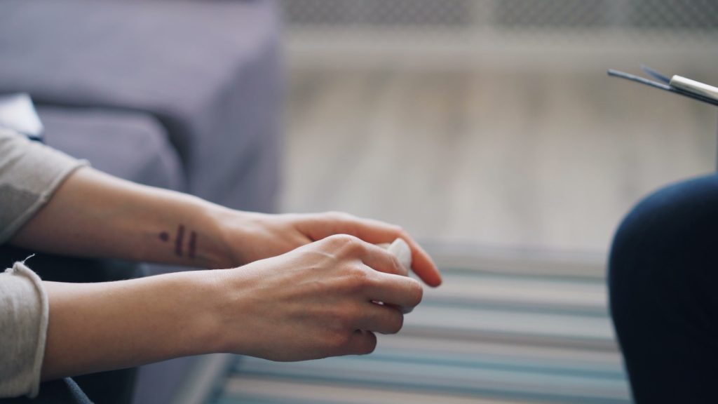 therapy session - Blair Nicole | Mental Health, Relationships, Travel a person with a small tattoo on their arm
