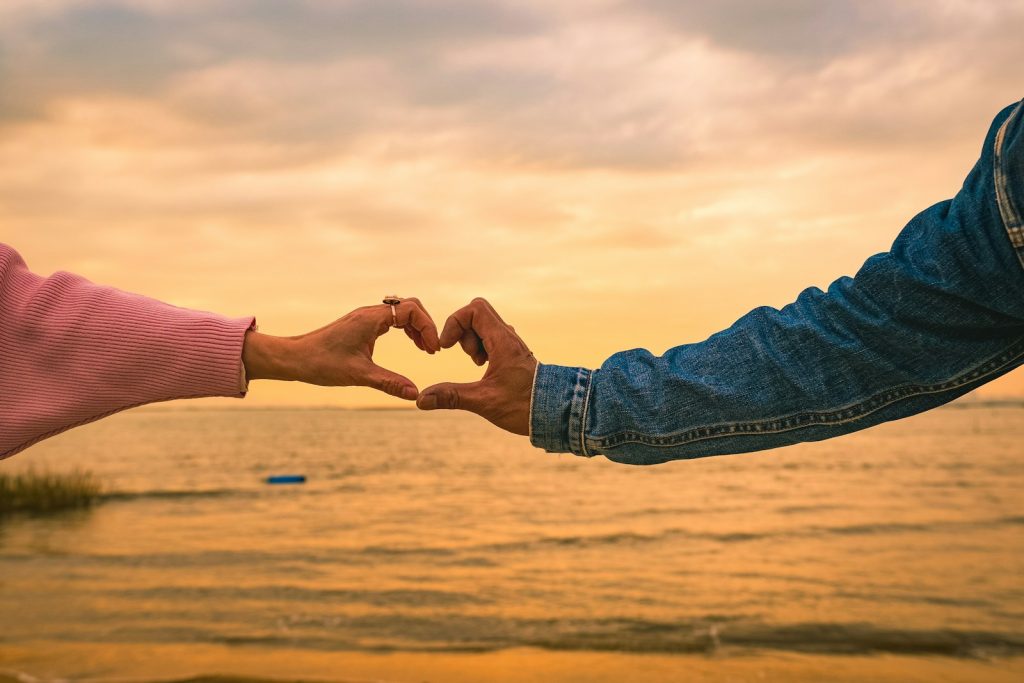 couple heart hands - Blair Nicole | Mental Health, Relationships, Travel two people making a heart shape with their hands